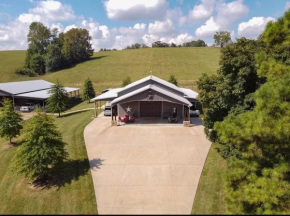 Unique home on a beautiful ranch w/ stocked pond